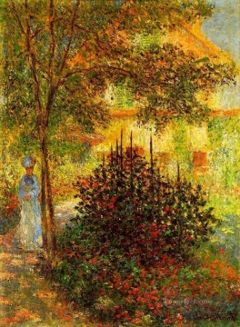 Claude Monet Painting - Camille Monet en el jardín de la casa de Claude Monet en Argenteuil